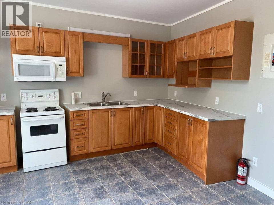Multi-family at 249 CHURCH Street, St. Catharines, Ontario - Photo 4 - RE/MAX Garden City Realty