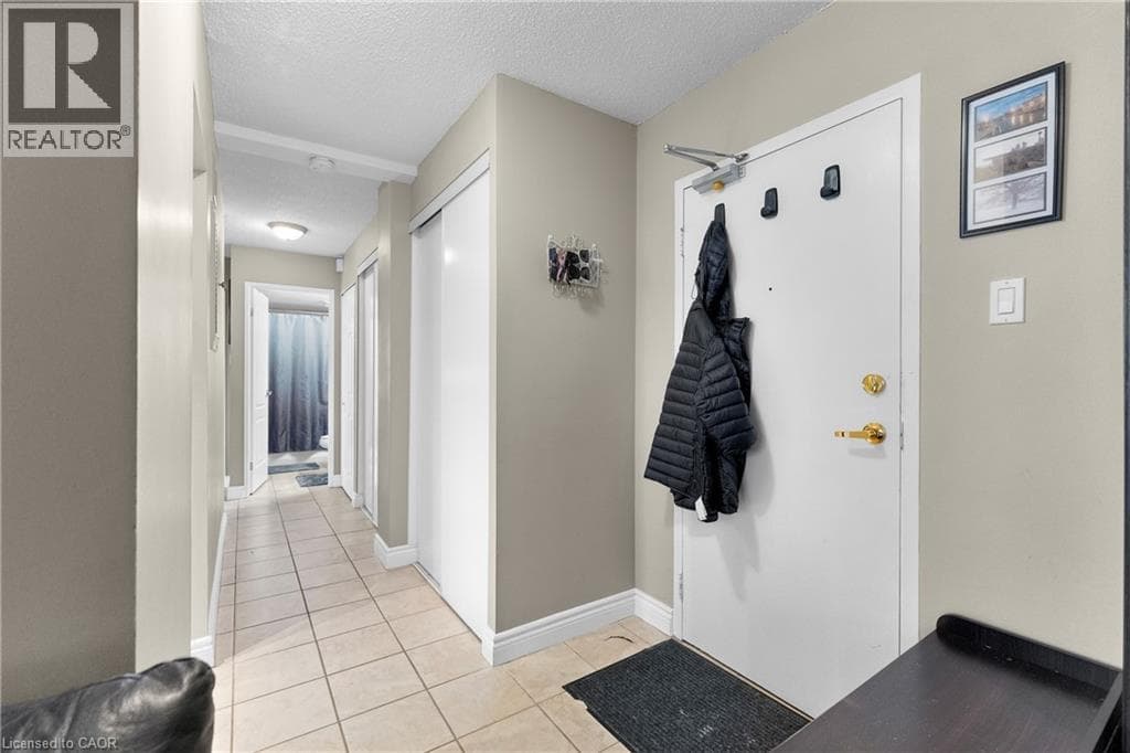 Single Family at 407- 6390 HUGGINS Street, Niagara Falls, Ontario - Photo 3 - RE/MAX Garden City Realty
