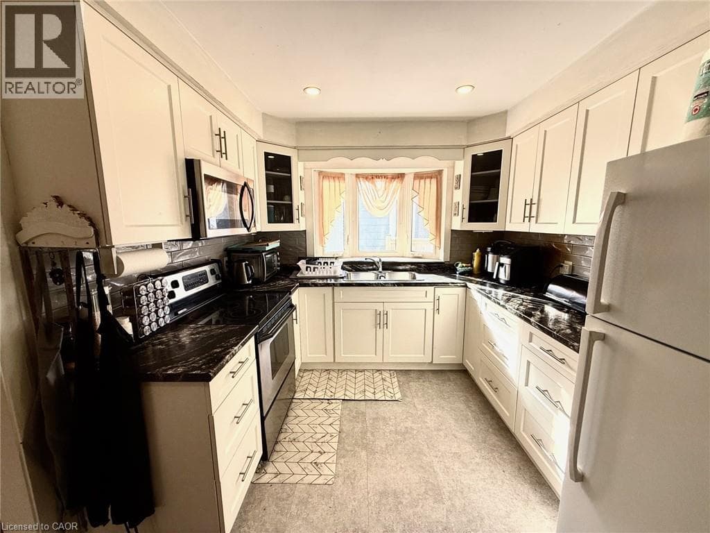 Multi-family at 17 LYONS Avenue, Welland, Ontario - Photo 3 - RE/MAX Garden City Realty
