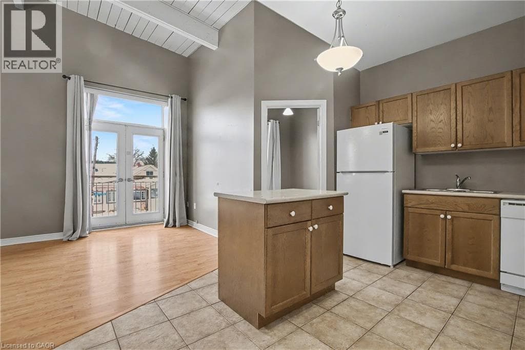 Single Family at 207- 6365 DRUMMOND Road, Niagara Falls, Ontario - Photo 5 - RE/MAX Garden City Realty