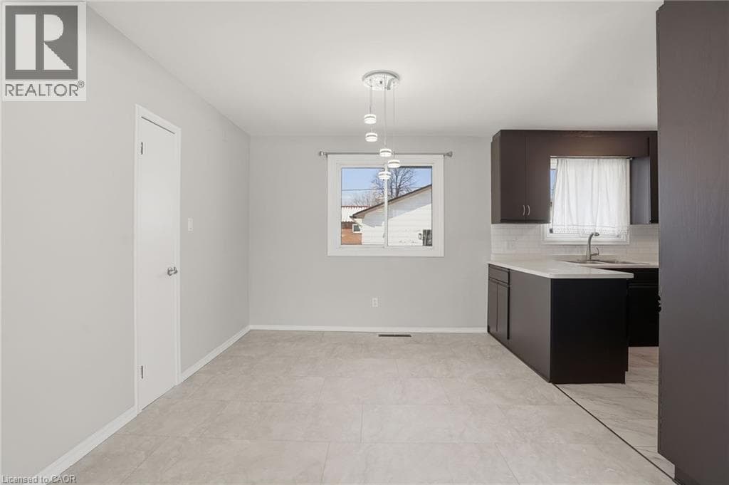 Multi-family at 93 WELLINGTON Street, Welland, Ontario - Photo 9 - RE/MAX Garden City Realty