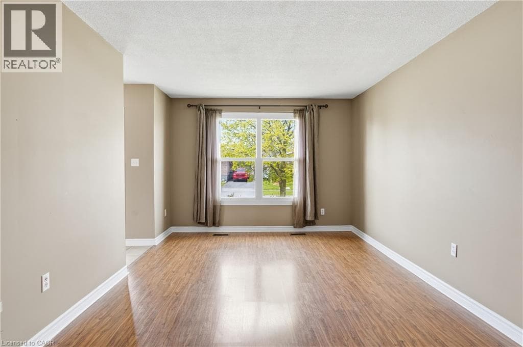 Single Family at 87 MARC Boulevard, Welland, Ontario - Photo 4 - RE/MAX Garden City Realty