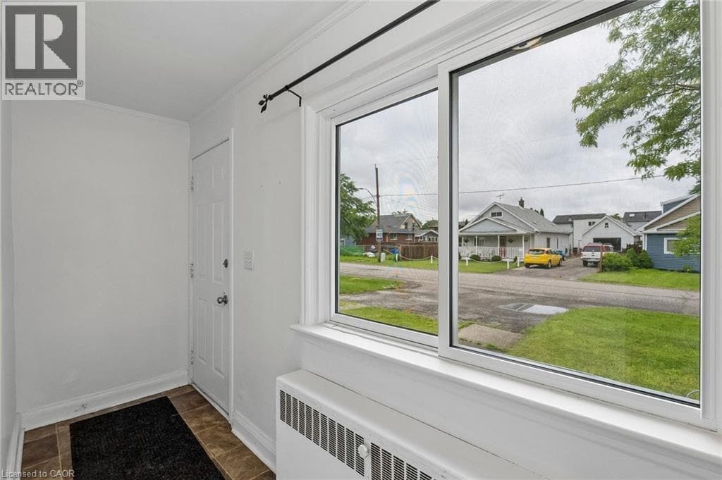 Multi-family at 53 KINSEY Street, St. Catharines, Ontario - Photo 5 - RE/MAX Garden City Realty