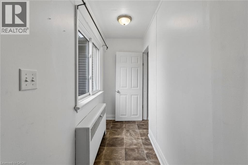 Multi-family at 53 KINSEY Street, St. Catharines, Ontario - Photo 4 - RE/MAX Garden City Realty