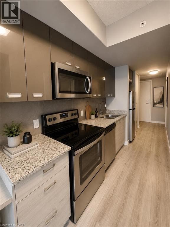 Single Family at 311- 250 ALBERT Street, Waterloo, Ontario - Photo 2 - RE/MAX Garden City Realty