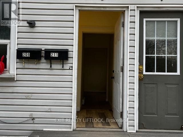 Multi-family at 209 Stewart Street, Peterborough (Town Ward 3), Ontario - Photo 2 - RE/MAX Garden City Realty