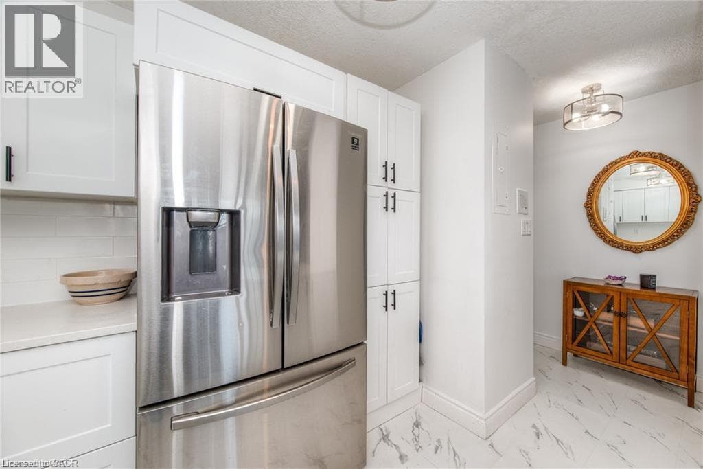 Single Family at 402- 225 HARVARD Place, Waterloo, Ontario - Photo 3 - RE/MAX Garden City Realty