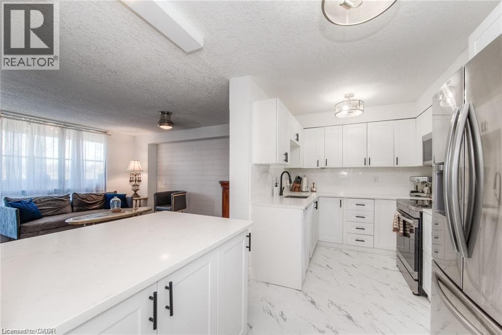 Single Family at 402- 225 HARVARD Place, Waterloo, Ontario - Photo 2 - RE/MAX Garden City Realty