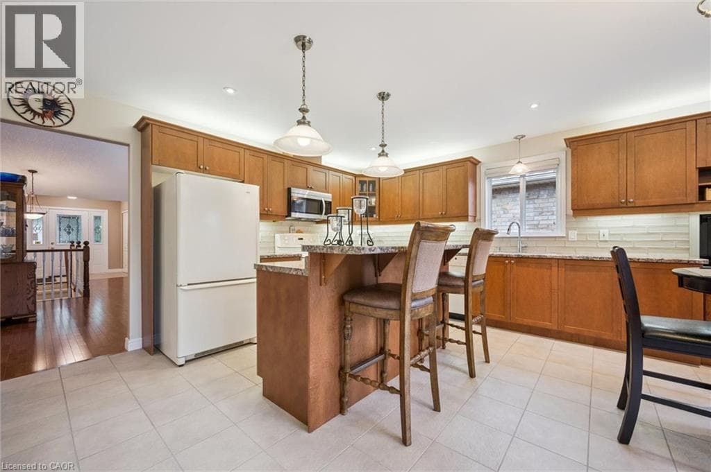 Single Family at 555 KILLBEAR Court, Waterloo, Ontario - Photo 6 - RE/MAX Garden City Realty