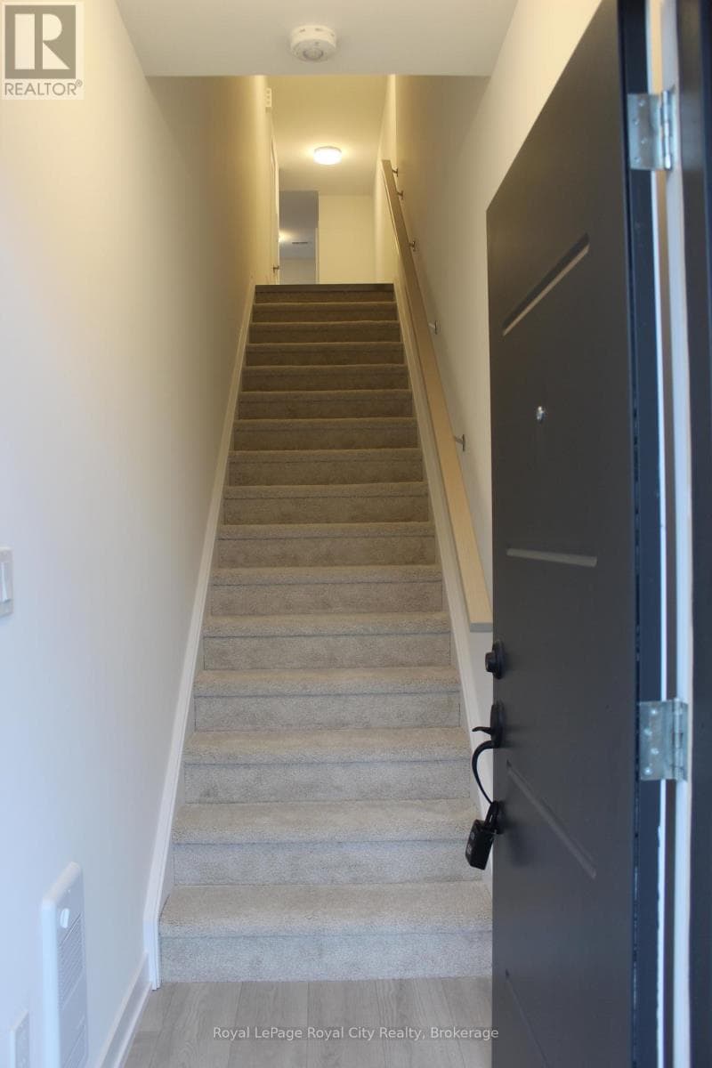 Single Family at 34- 42 Lowes Road, Guelph (Clairfields/Hanlon Business Park), Ontario - Photo 3 - RE/MAX Garden City Realty