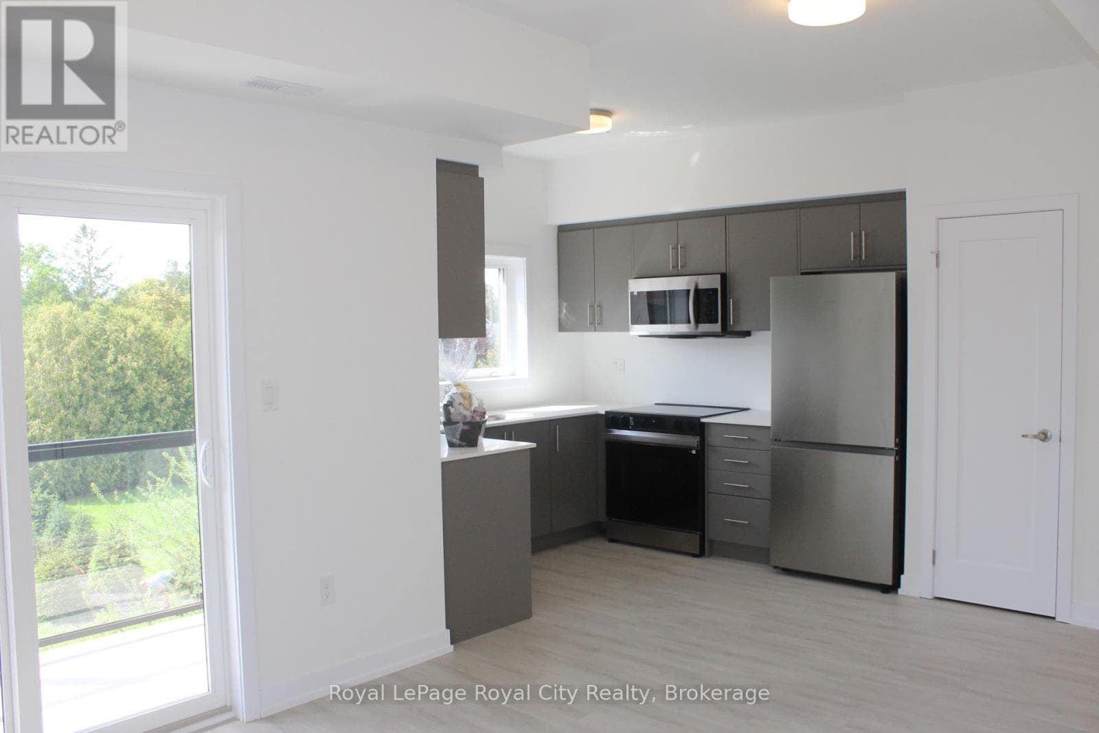 Single Family at 34- 42 Lowes Road, Guelph (Clairfields/Hanlon Business Park), Ontario - Photo 8 - RE/MAX Garden City Realty