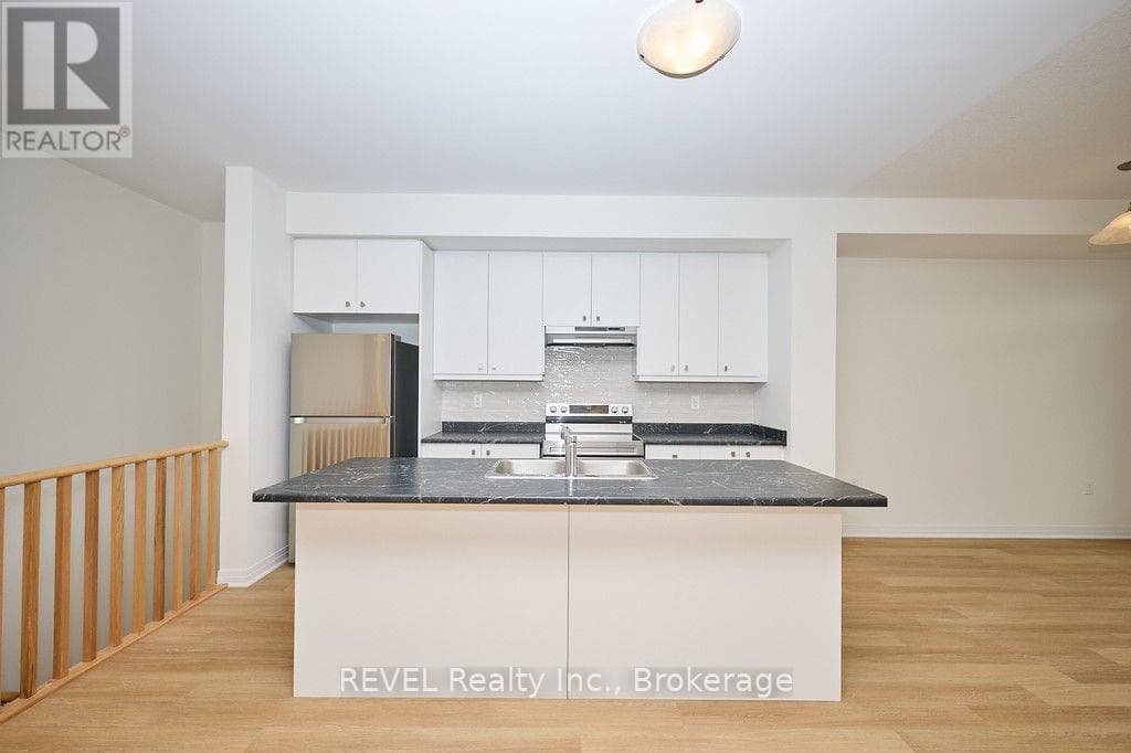Single Family at 68 Feather Road, Welland (Dain City), Ontario - Photo 6 - RE/MAX Garden City Realty