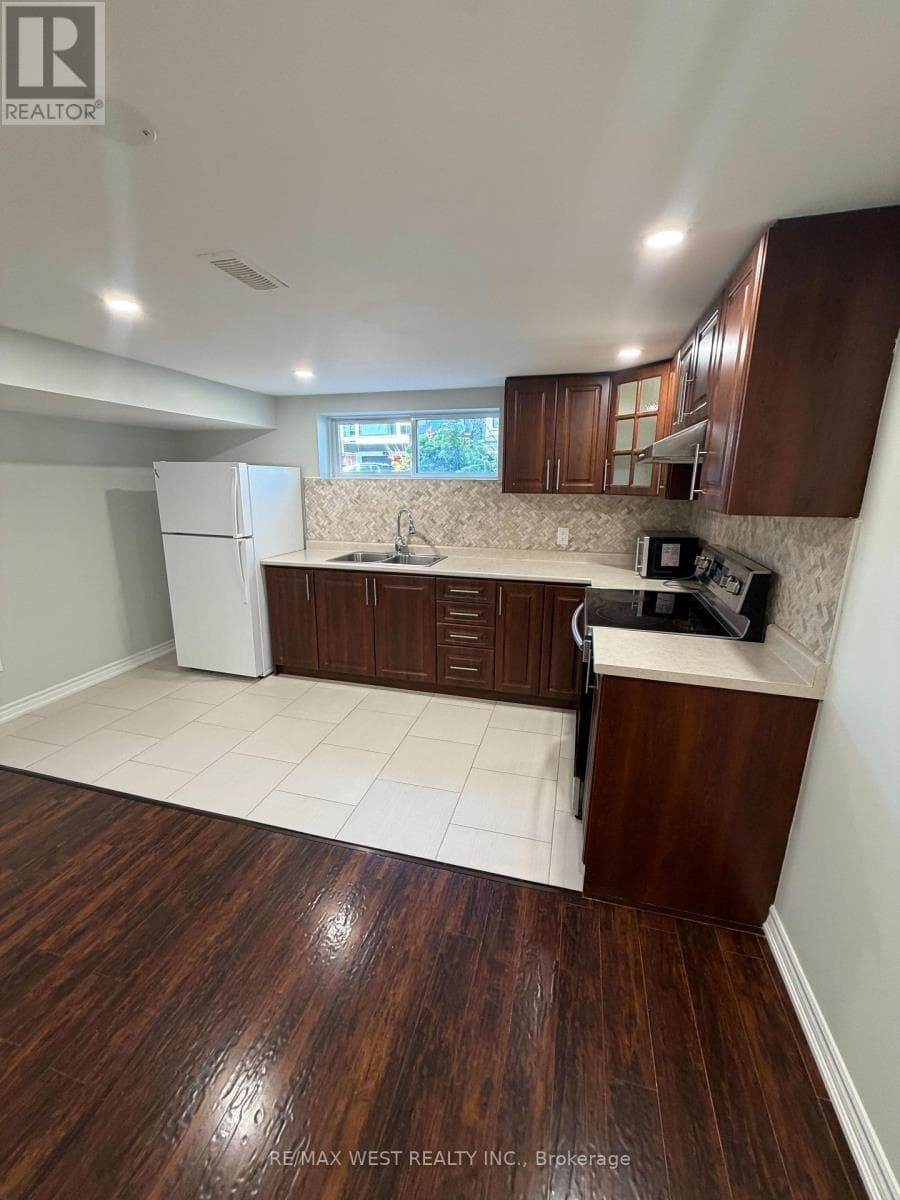 Single Family at 15 Macleod Street, Toronto (Maple Leaf), Ontario - Photo 2 - RE/MAX Garden City Realty