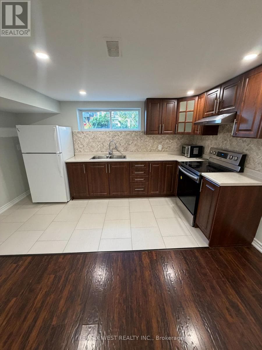 Single Family at 15 Macleod Street, Toronto (Maple Leaf), Ontario - Photo 3 - RE/MAX Garden City Realty