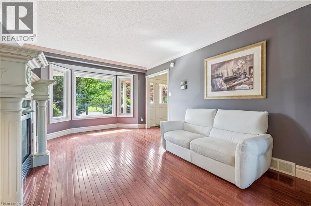 Single Family at 21 TINATAWA Court, Kitchener, Ontario - Photo 4 - RE/MAX Garden City Realty