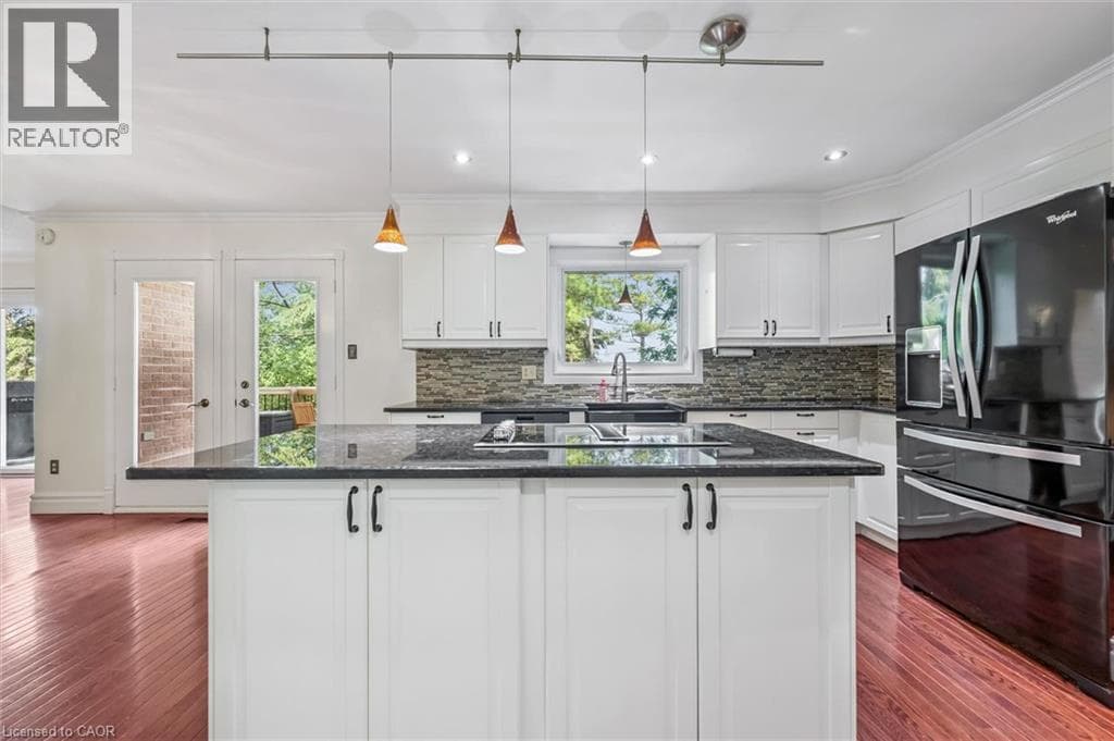 Single Family at 21 TINATAWA Court, Kitchener, Ontario - Photo 6 - RE/MAX Garden City Realty