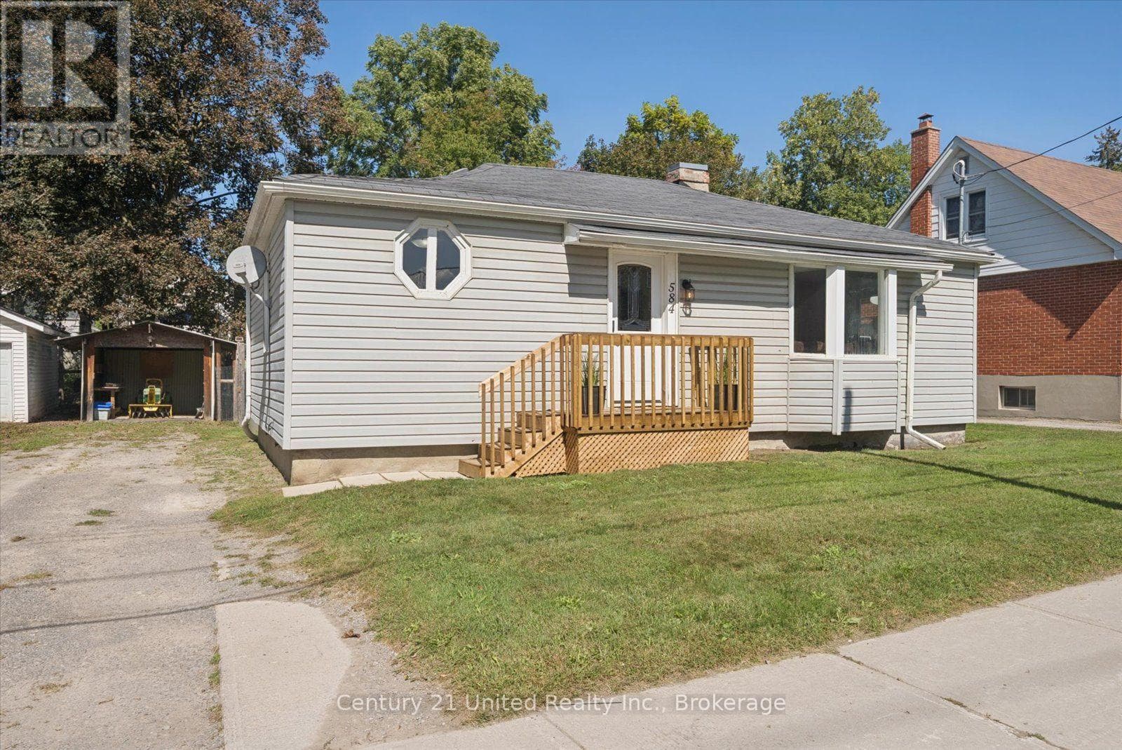 Single Family at 584 Wolfe Street, Peterborough (Town Ward 3), Ontario - Photo 1 - RE/MAX Garden City Realty