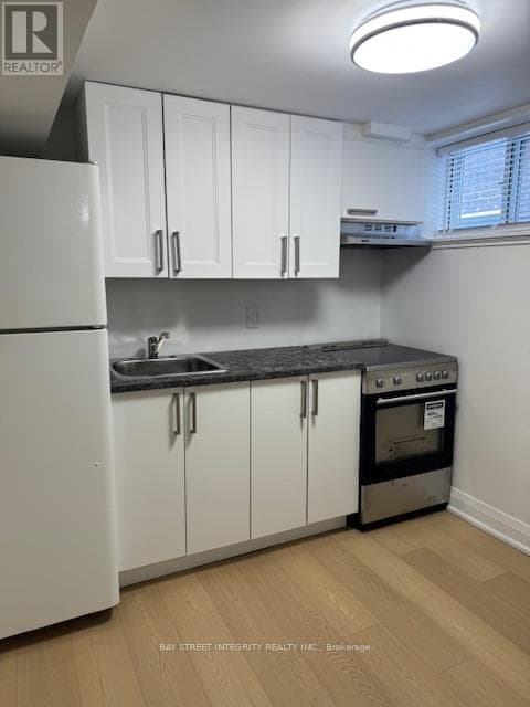 Single Family at 244 King Edward Avenue, Toronto (Woodbine-Lumsden), Ontario - Photo 5 - RE/MAX Garden City Realty