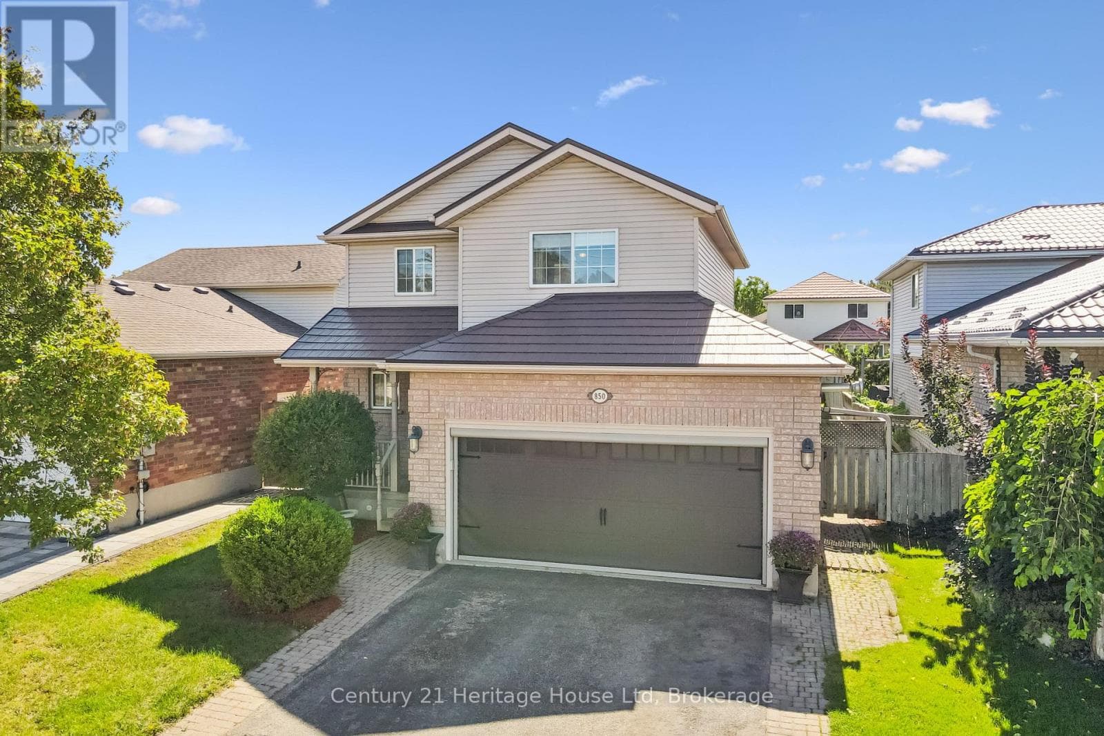 Single Family at 850 Paisley Road, Guelph (Willow West/Sugarbush/West Acres), Ontario - Photo 3 - RE/MAX Garden City Realty
