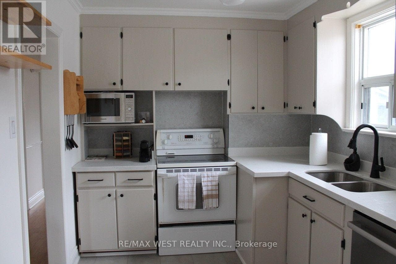 Single Family at Main- 14 Treeview Drive, Toronto (Alderwood), Ontario - Photo 6 - RE/MAX Garden City Realty