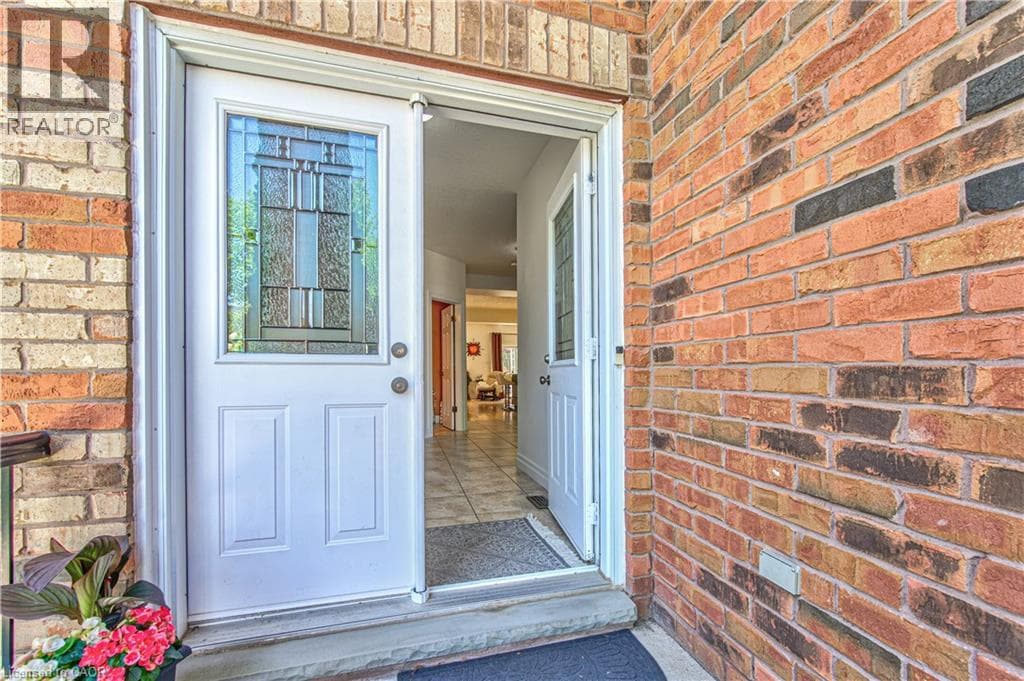 Single Family at 87 STEEPLERIDGE Street, Kitchener, Ontario - Photo 5 - RE/MAX Garden City Realty