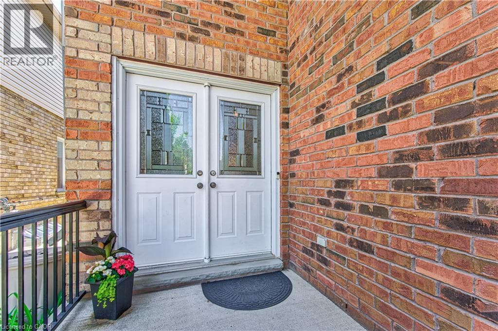 Single Family at 87 STEEPLERIDGE Street, Kitchener, Ontario - Photo 4 - RE/MAX Garden City Realty