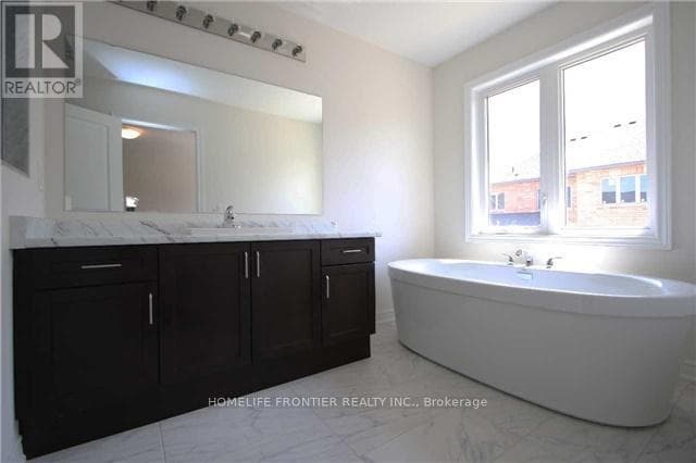Single Family at 7 Frederick Pearson Street, East Gwillimbury (Queensville), Ontario - Photo 9 - RE/MAX Garden City Realty