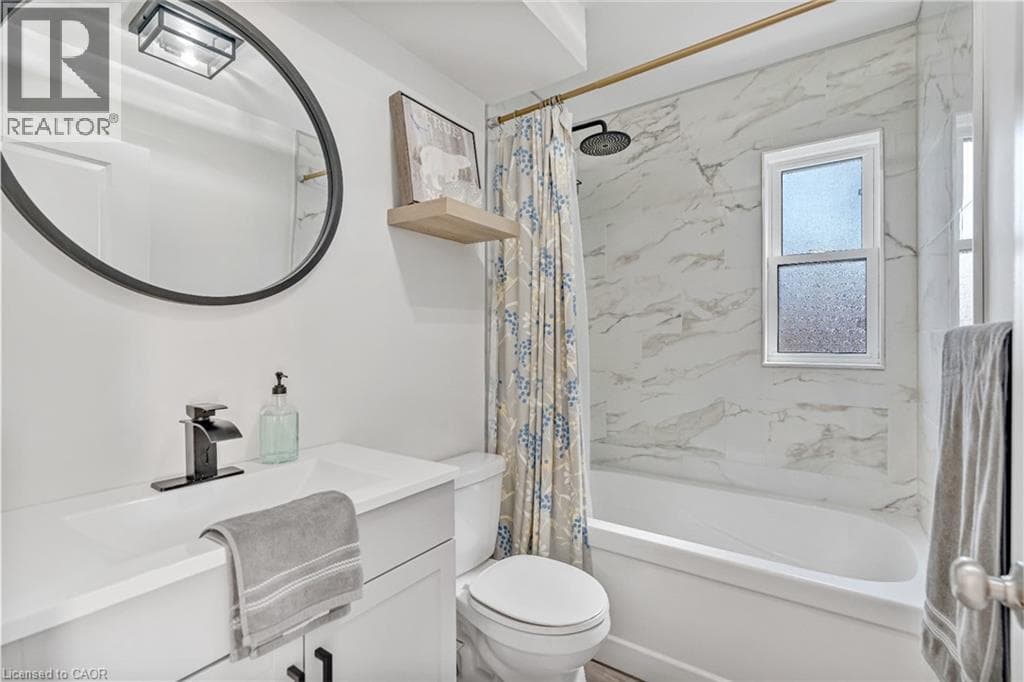 Single Family at 168 CARLTON Street, St. Catharines, Ontario - Photo 6 - RE/MAX Garden City Realty