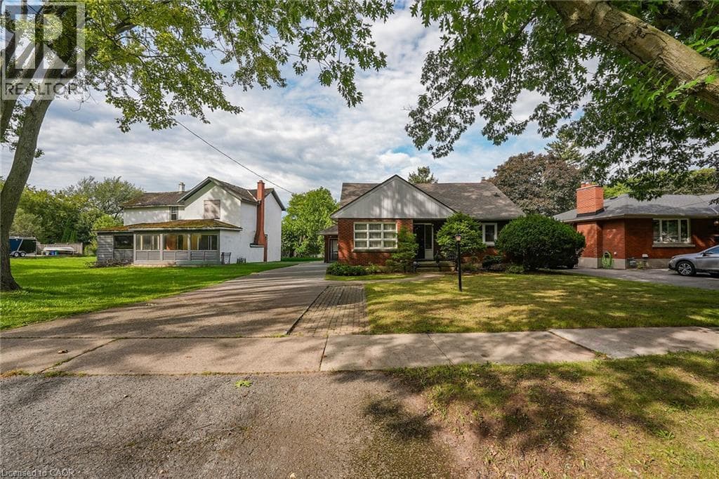 Single Family at 5049 PORTAGE Road, Niagara Falls, Ontario - Photo 2 - RE/MAX Garden City Realty