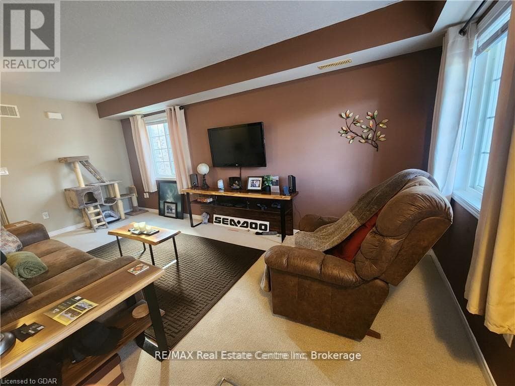 Single Family at 95- 35 MOUNTFORD Drive, Guelph (Grange Road), Ontario - Photo 3 - RE/MAX Garden City Realty