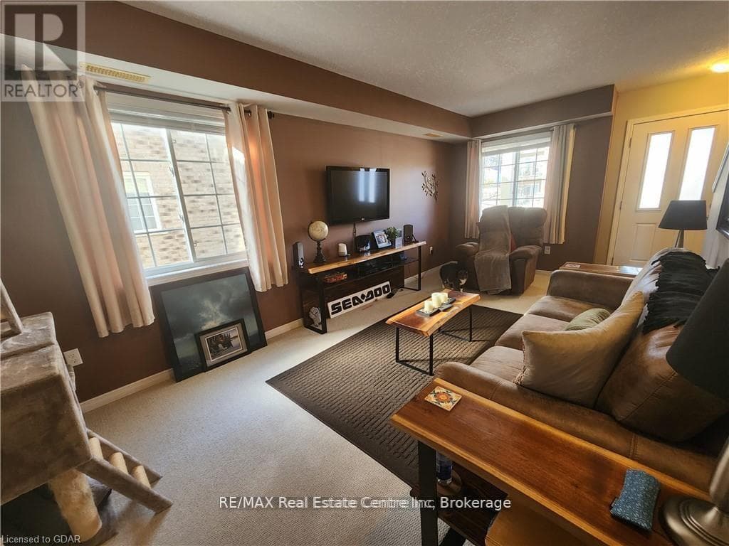 Single Family at 95- 35 MOUNTFORD Drive, Guelph (Grange Road), Ontario - Photo 4 - RE/MAX Garden City Realty