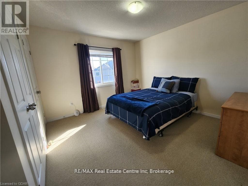 Single Family at 95- 35 MOUNTFORD Drive, Guelph (Grange Road), Ontario - Photo 9 - RE/MAX Garden City Realty
