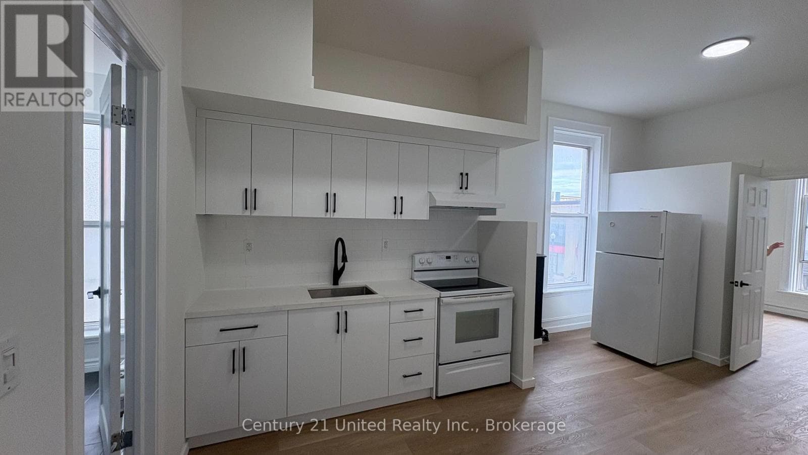 Multi-family at 9- 172.5 Hunter Street, Peterborough (Town Ward 3), Ontario - Photo 2 - RE/MAX Garden City Realty