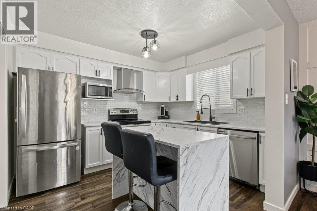 Single Family at 347 BANKSIDE Drive, Kitchener, Ontario - Photo 10 - RE/MAX Garden City Realty