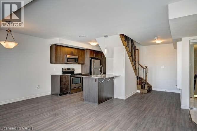 Single Family at 140 DAYLILY Lane, Kitchener, Ontario - Photo 7 - RE/MAX Garden City Realty