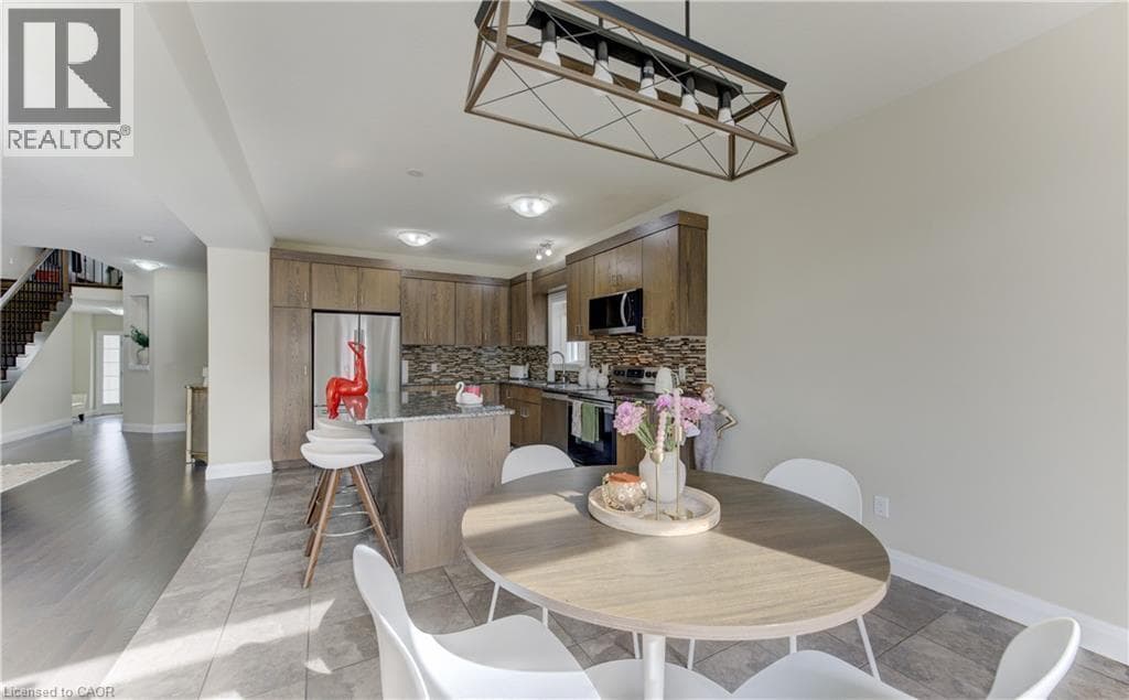 Single Family at 519 GRISTMILL Street, Waterloo, Ontario - Photo 5 - RE/MAX Garden City Realty
