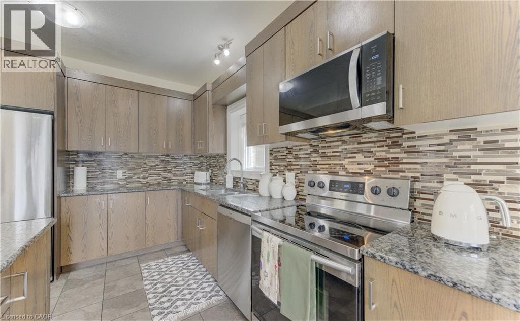 Single Family at 519 GRISTMILL Street, Waterloo, Ontario - Photo 7 - RE/MAX Garden City Realty