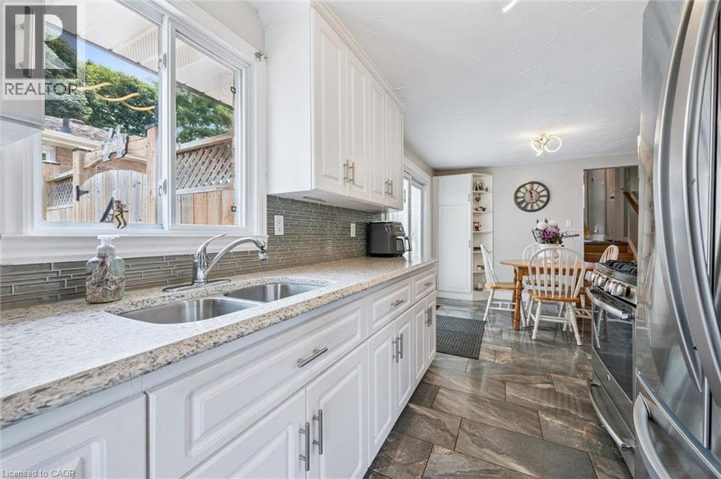 Single Family at 847 DOON VILLAGE Road, Kitchener, Ontario - Photo 5 - RE/MAX Garden City Realty