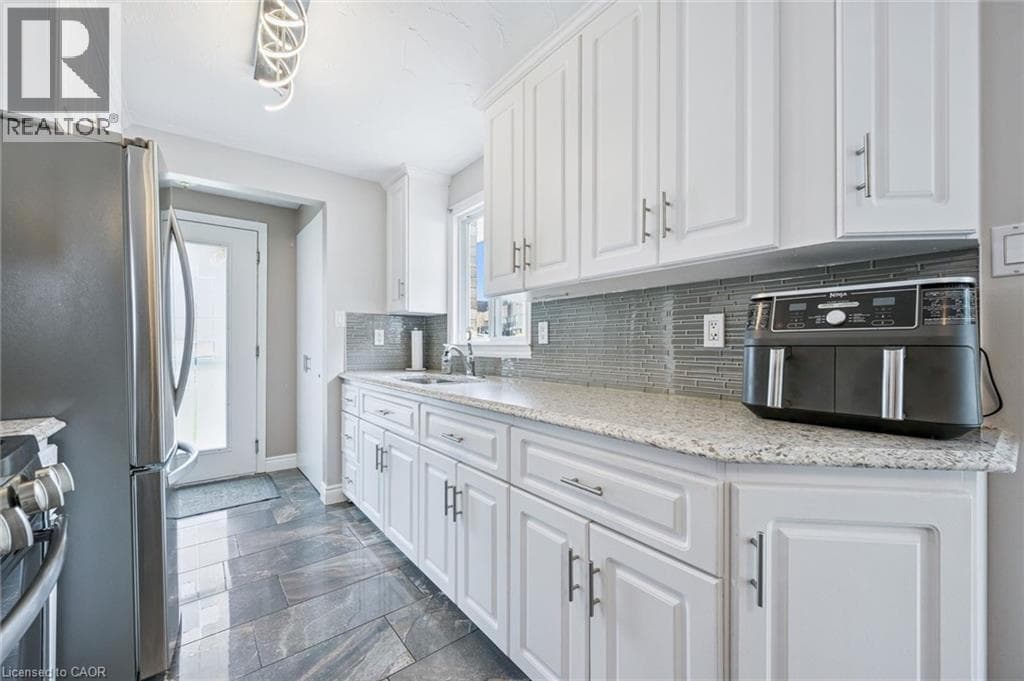 Single Family at 847 DOON VILLAGE Road, Kitchener, Ontario - Photo 8 - RE/MAX Garden City Realty