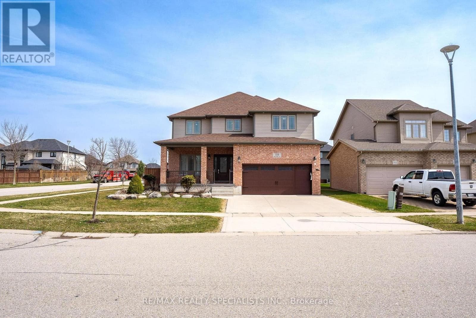 Single Family at 708 Spitfire Street, Woodstock (Woodstock - North), Ontario - Photo 2 - RE/MAX Garden City Realty