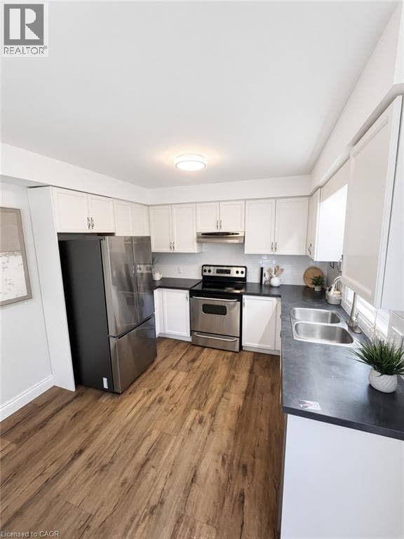 Single Family at 765 ANGLER Way, Waterloo, Ontario - Photo 4 - RE/MAX Garden City Realty